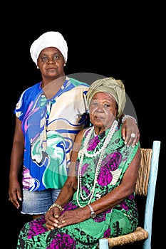 elderly african  mother and her daughter