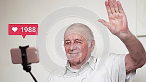 Elderly amn with selfie stick and camera going live and recieving many likes, viral content 4k