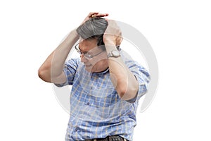 An elderly Asian man uses both hands to hold his head, And painful pain from neurological diseases