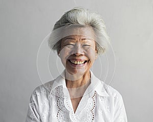 Elderly asian woman smiling face expression portrait