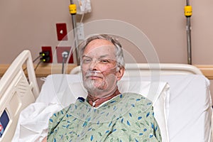 Elderly Man in Hospital Bed