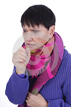 Elderly coughing woman with scarf and pullover