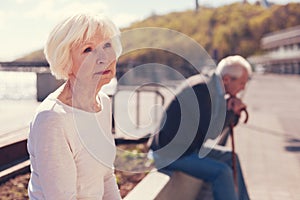 Elderly couple being absorbed into unsettling thoughts