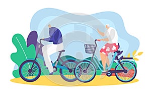Elderly couple bicycling together in the park. Senior man and woman enjoying bike ride outdoors. Active seniors and