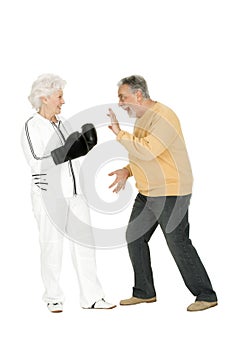 Elderly couple with boxing gloves