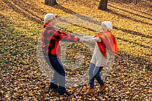 An elderly couple is dancing. Smiling old woman. Movement is life. I feel young again