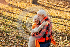 An elderly couple is dancing. Smiling old woman. Movement is life. I feel young again