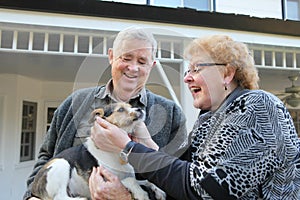 Elderly Couple with Dog