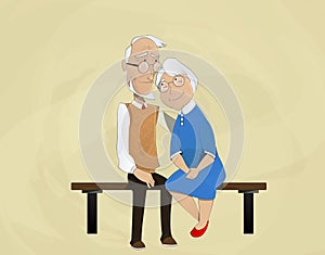 Elderly couple embracing sitting on bench.