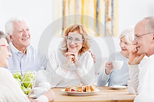 Elderly couple with friendly neighbors