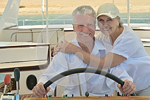 Elderly couple have a ride in a boat