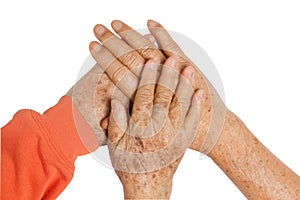 Elderly couple holding hands