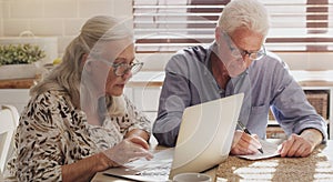 Elderly couple, laptop and kitchen for research, financial budget and online investment for mortgage payment in