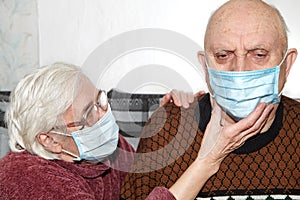 Elderly couple in a medical mask