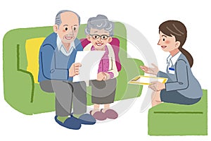 Elderly couple meeting with Geriatric care manager photo