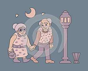 An elderly couple of people walk around the night city.
