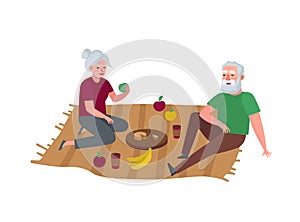 Elderly couple relaxing on picnic. Grandparents outdoor spending time together. Senior persons leisure vacation