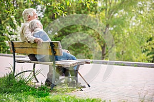 Elderly couple resting on a bench