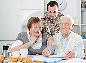 Elderly couple and social employee