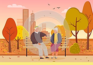 Elderly couple spend time in autumn city park sitting on bench. Romance of old-aged people on date
