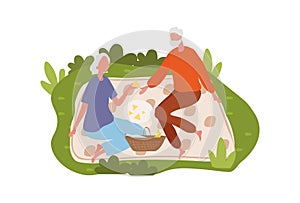 Elderly couple spending time at picnic