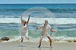 Elderly couple on tropical beach