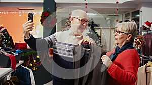 Elderly couple in videocall during xmas