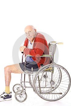 Elderly disabled man in wheelchair