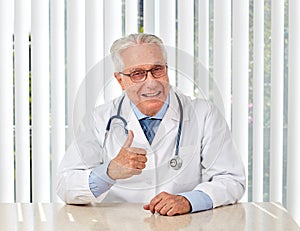 Elderly doctor man in hospital.