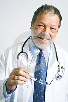 Elderly doctor smiling