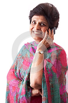 Elderly East Indian Lady talking on Cellphone