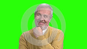 Elderly flirting man, green screen.