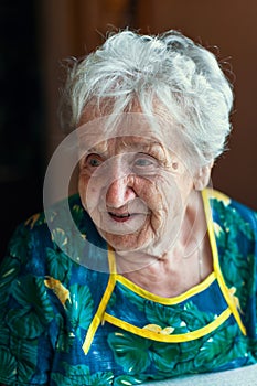 An elderly happy woman, closeup portrait.