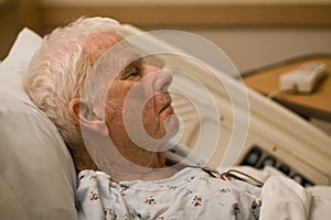 Elderly hospital patient sleeping