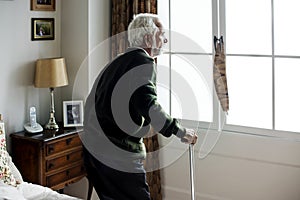 An elderly Indian man at the retirement house photo