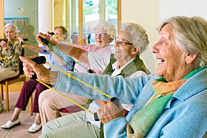 Elderly ladies exercising in a gym