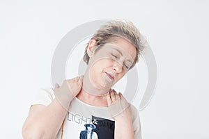 Elderly lady in excruciating neck tention