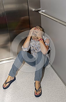 Elderly lady stuck in an elevator