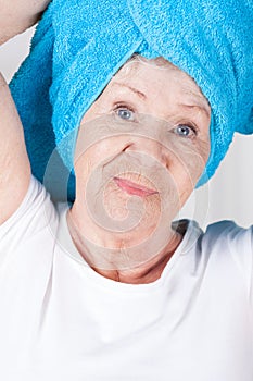 Elderly lady with towel