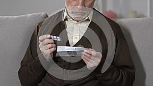 Elderly male reading pills dosage, side effect and precautions, pharmacology