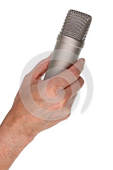 Elderly male singer holds vocal condenser microphone in his hand