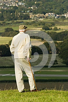 Elderly man admiring the view photo