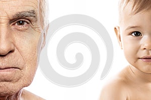 Elderly man and baby boy. Concept of rebirth and cycle of life.