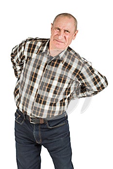 elderly man with back pains on a white background