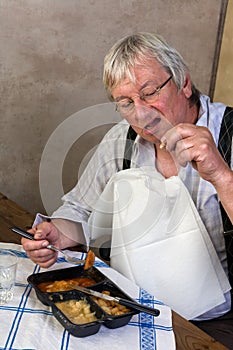 Elderly man with broken tooth