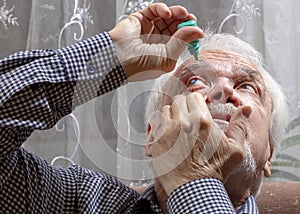 Elderly man buries medicine in his eyes