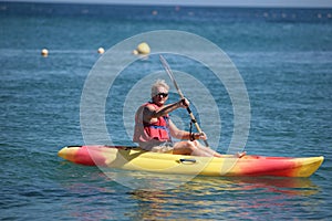 Elderly Man in canoe