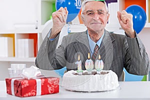 Elderly man celebrating birthday