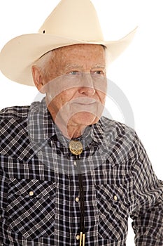 Elderly man cowboy close look side