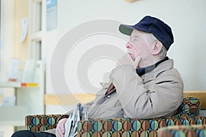 Elderly man deep in thought